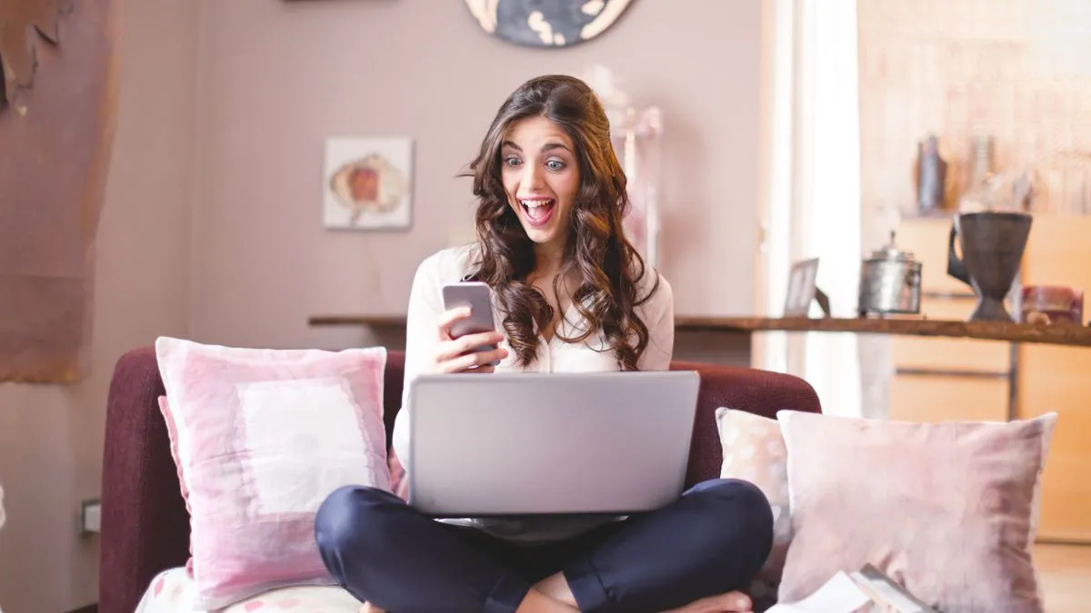 Woman happy after getting instant approval for an online loan