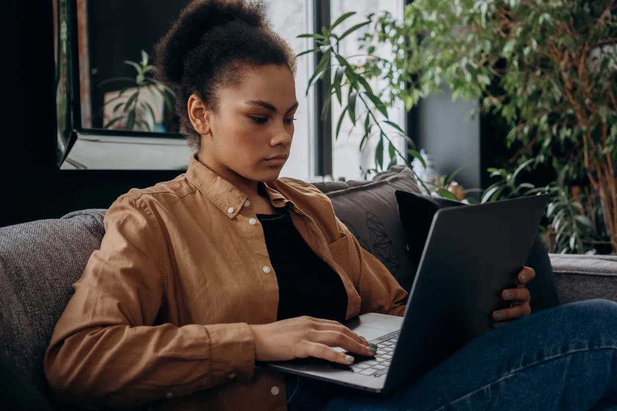 Alberta borrower filling out an application for no credit check loans Alberta lenders accept online