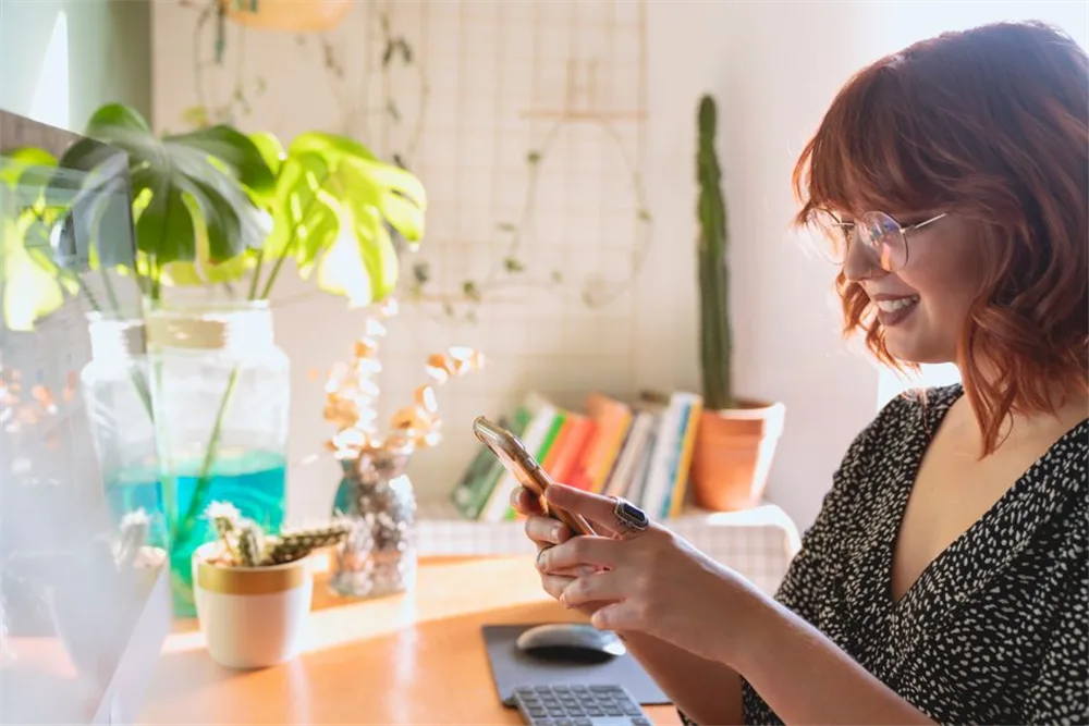 Woman smiling after her bad credit installment loan is approved by e-transfer