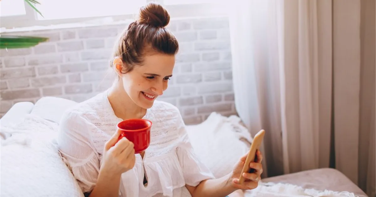 Woman checking bad credit installment loans in Canada on her phone
