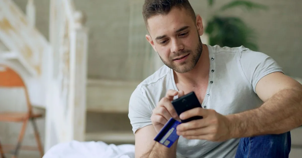 Applying for a $400 no credit check loan in Canada on a phone