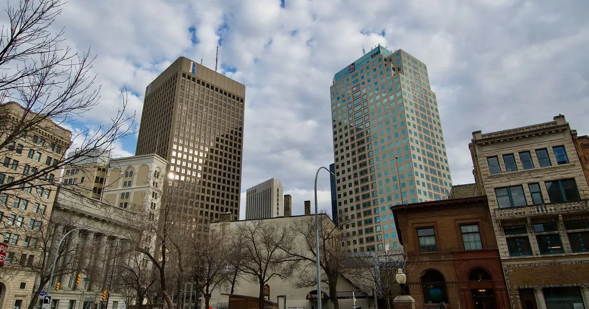 Instant loans Manitoba residents apply for online, with downtown Winnipeg towers over Main Street