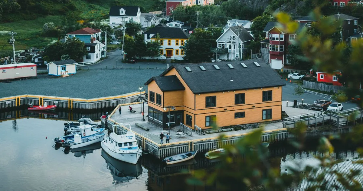 Instant loans Newfoundland residents apply for online, with Quidi Vidi village harbour in St. Johns