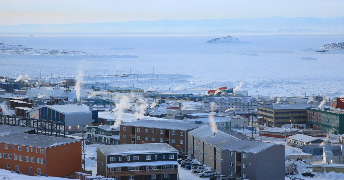 Instant loans Nunavut residents apply for online, with the winter townscape of Iqaluit on Frobisher Bay