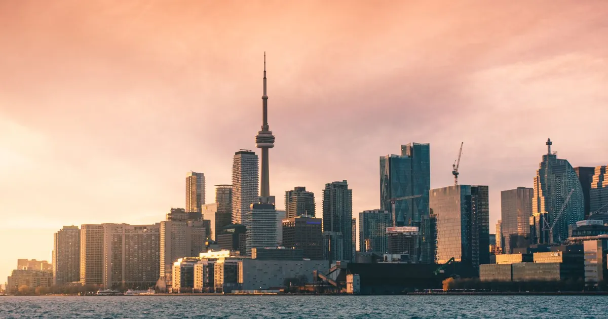 Toronto skyline at sunset, where no credit check installment loans follow the same federal cap as everywhere in Canada